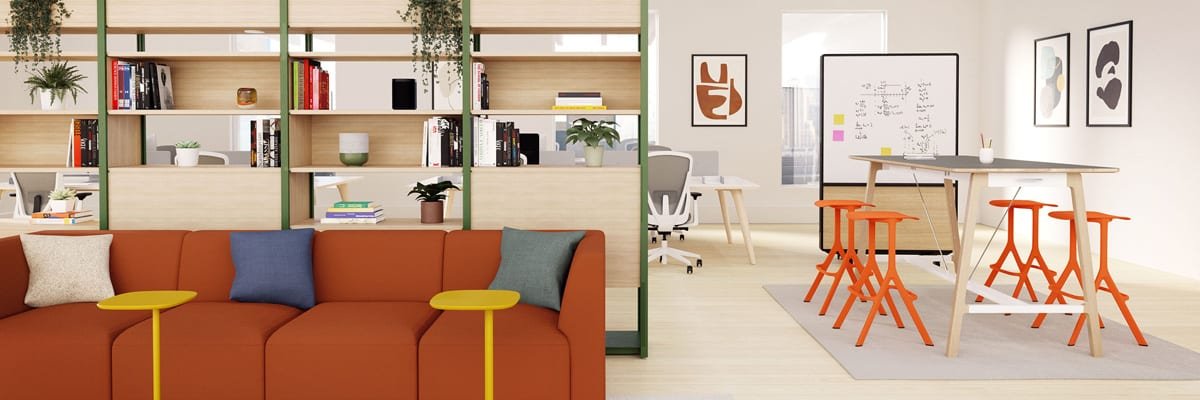 Modern colourful office with sofa, desks, tables and shelves